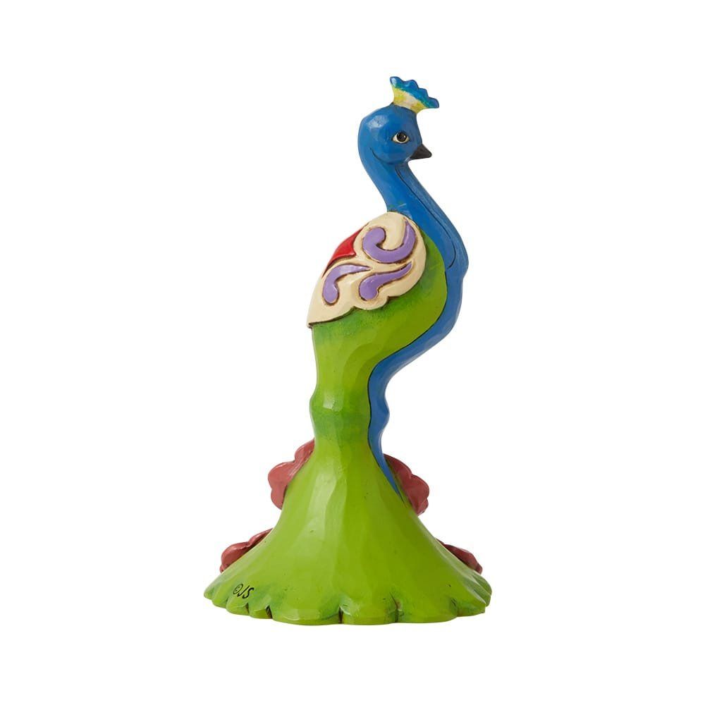 Blauw, groen en rood pauwenbeeldje met decoratieve beschildering, lachend.