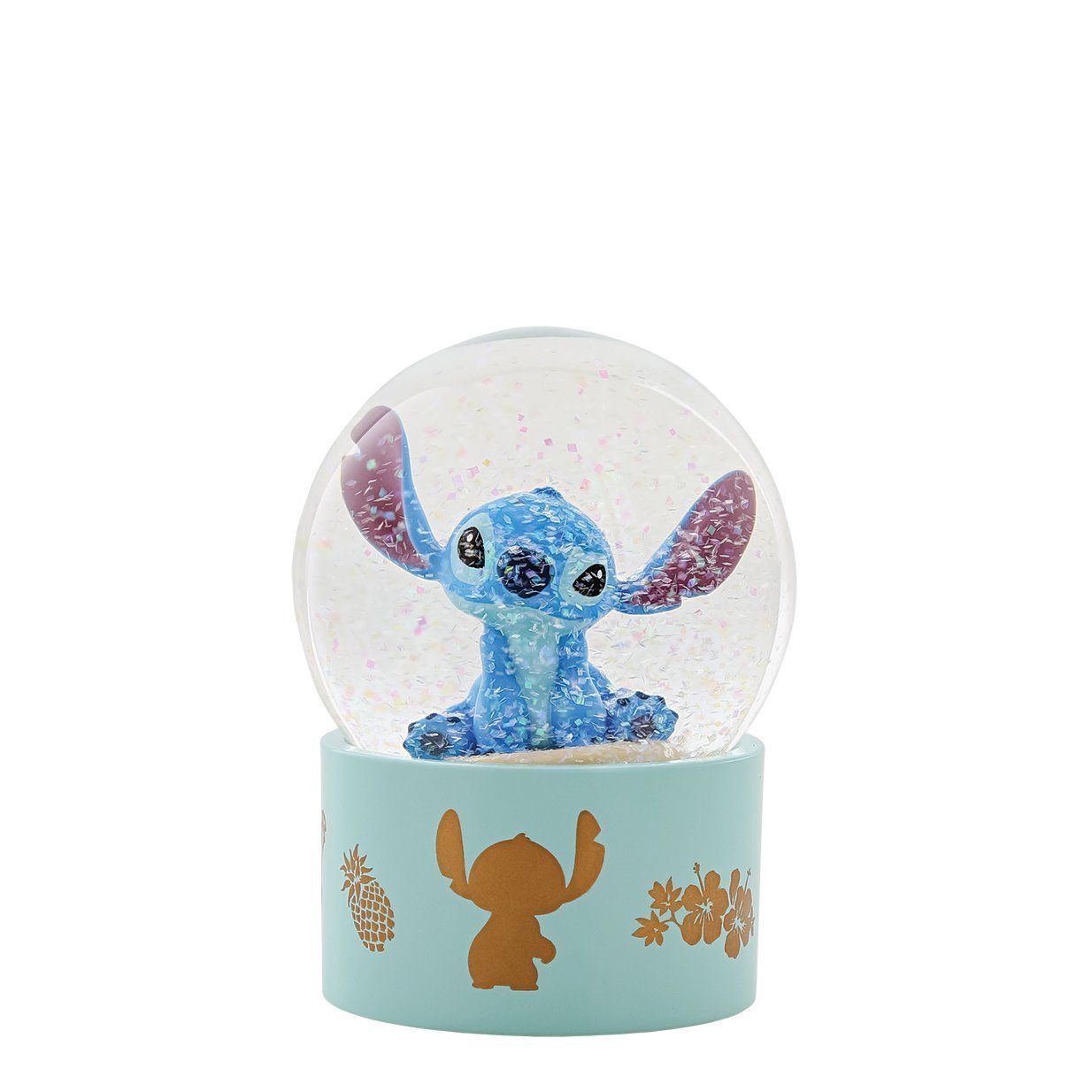 Een sneeuwbol met Stitch. Binnenin een blauwe Stitch-figuur, een lichtblauwe voet met een gouden silhouet en bloemaccenten.