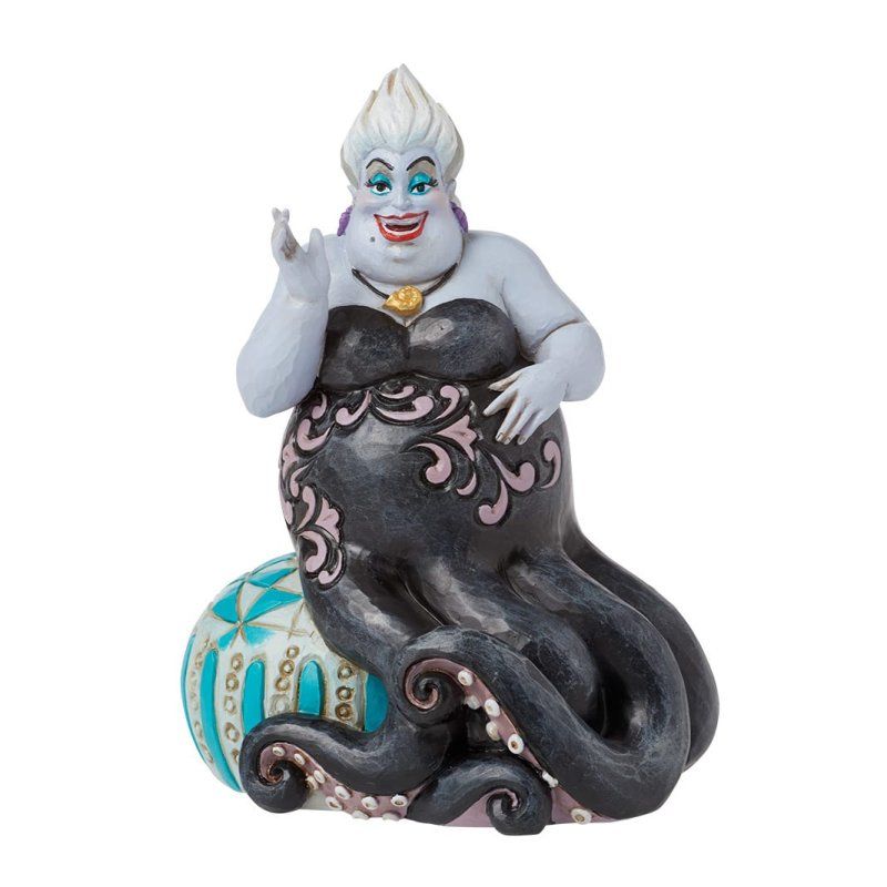 Een standbeeld van Ursula uit De Kleine Zeemeermin, met tentakels en een hand omhoog, bovenop een blauwe bal.