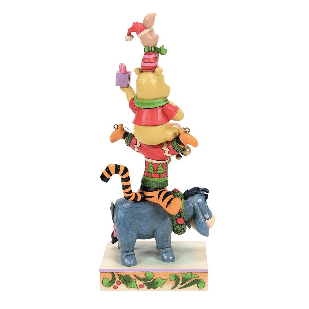 Winnie de Poeh en zijn vriendjes kerstfiguurtjes op elkaar gestapeld.