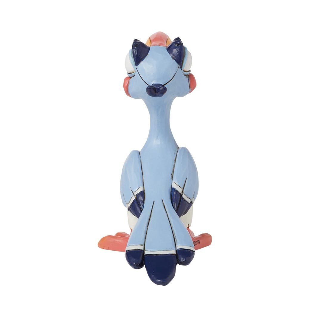 Een cartoonachtig vogelfiguurtje met een wit lijfje en blauwe en perzikkleurige accenten.