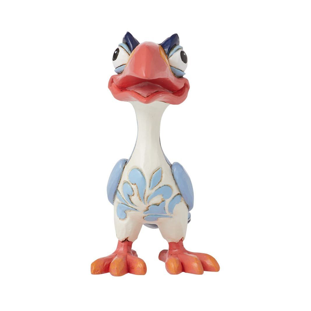 Een cartoonachtig vogelfiguurtje met een wit lijfje en blauwe en perzikkleurige accenten.