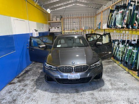 Small Black Car Open Doors — Sacramento, CA — Low Cost Auto Glass & Window Tinting