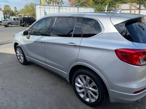 White Car Rearview — Sacramento, CA — Low Cost Auto Glass & Window Tinting