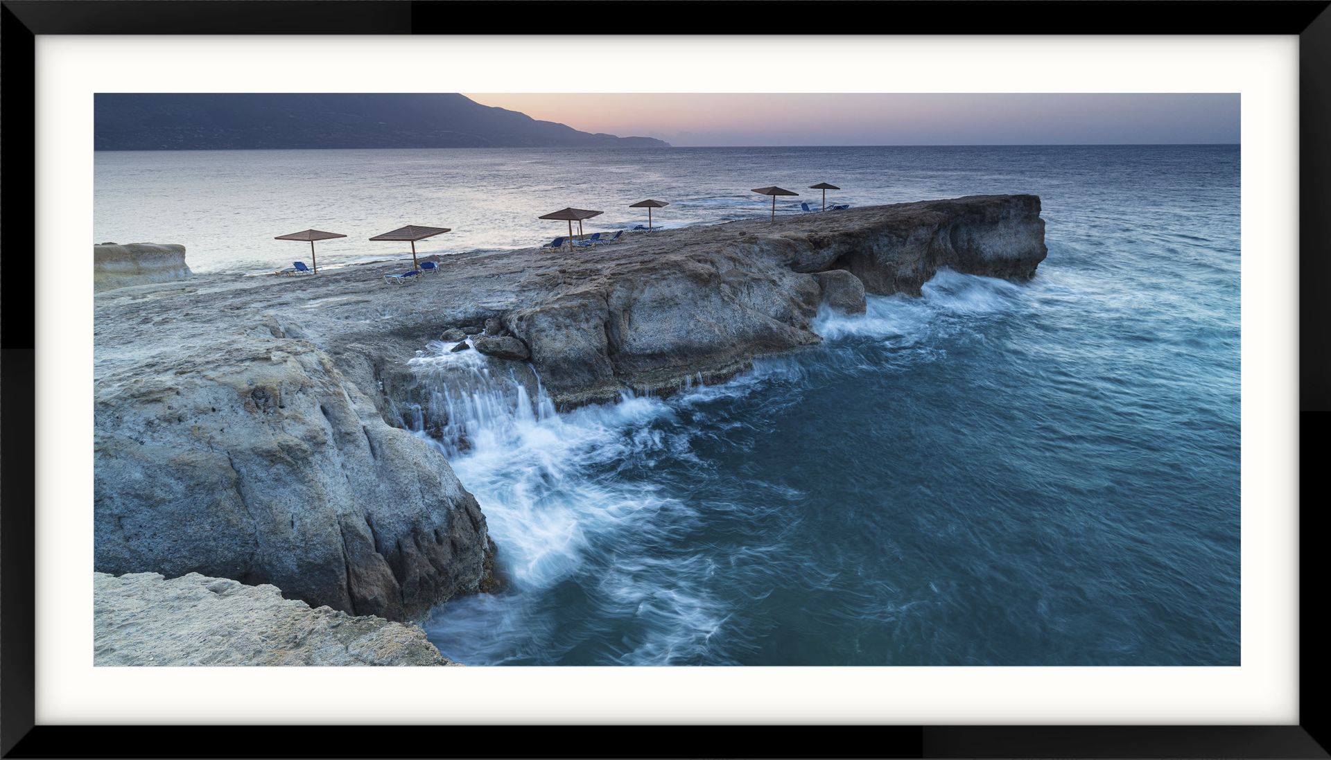Kefalonia Island in Greece - a picture of a beach with umbrellas and chairs