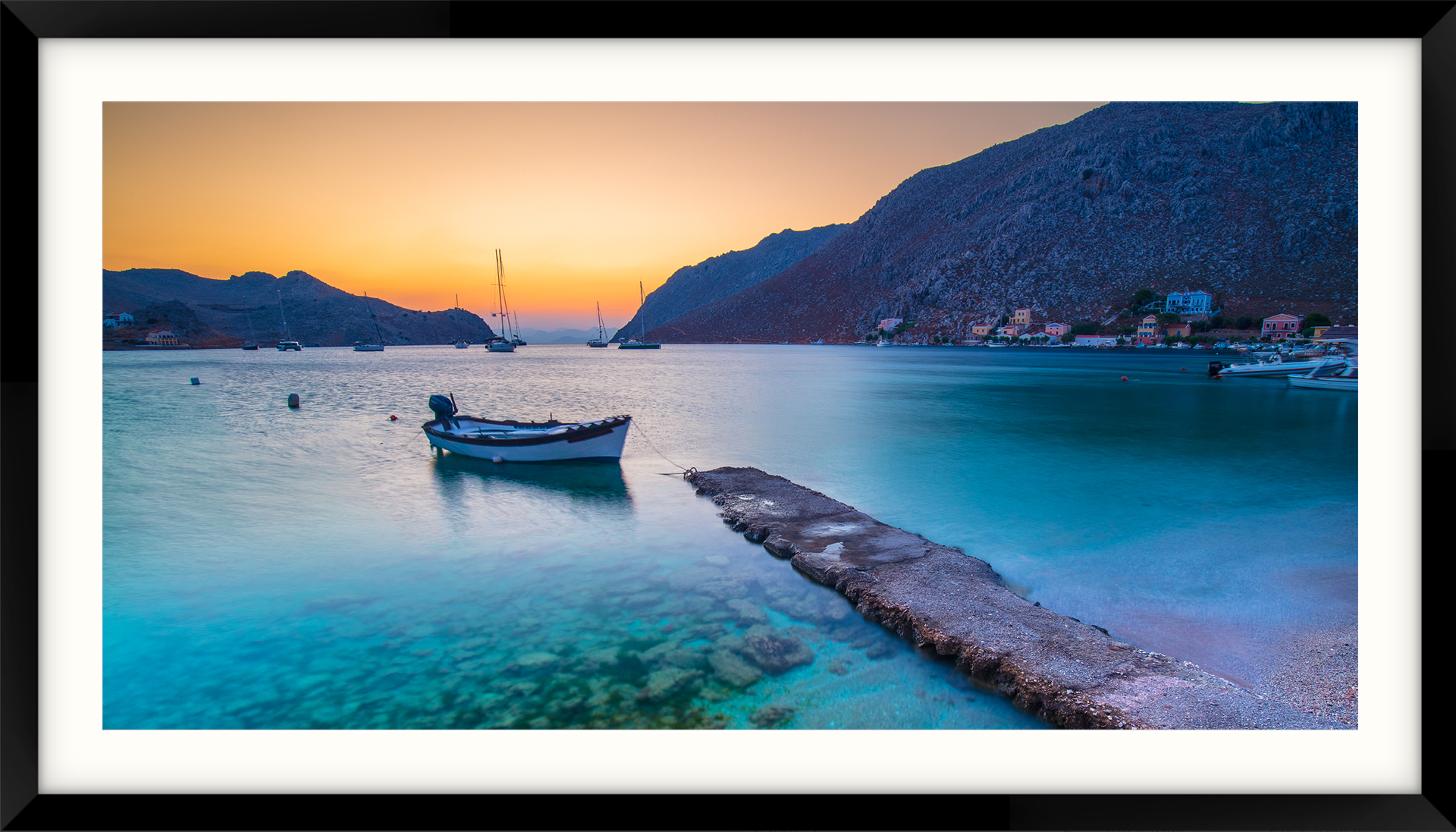 a picture of a harbor with boats in it