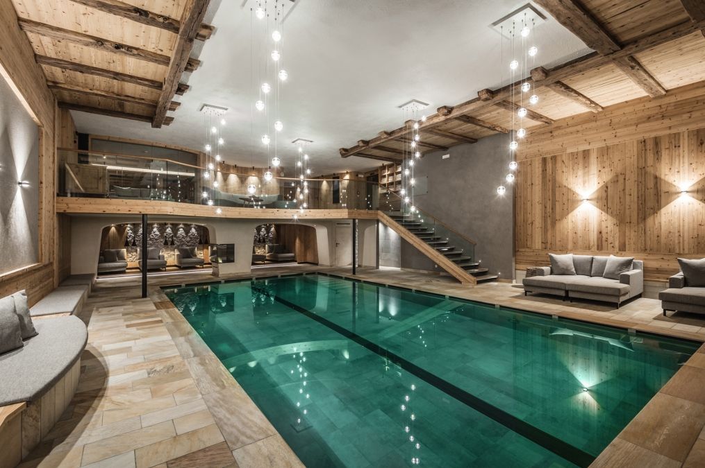 Private alpine wellness experience surrounded by snowy mountains