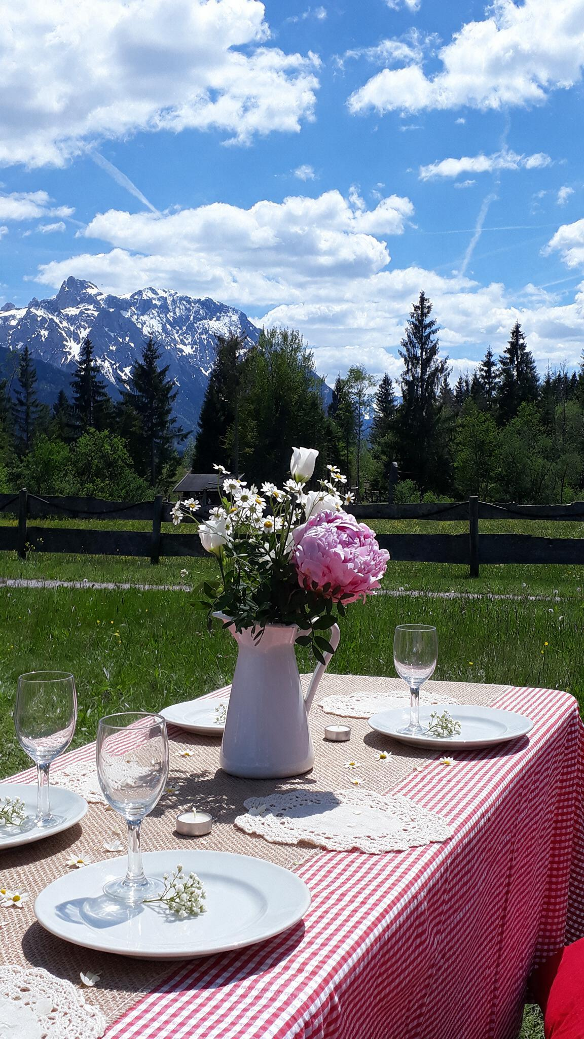 Luxury destination wedding dinner with elegant floral design and candlelight atmosphere