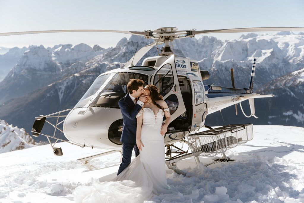 Exclusive alpine destination wedding with helicopter experience in the mountains