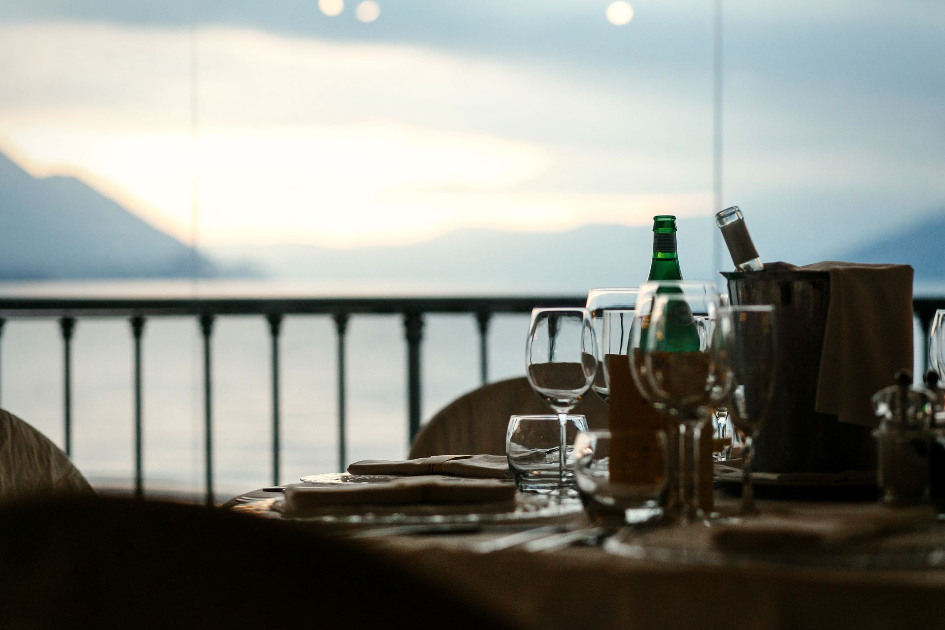 Luxury destination wedding reception in the Alps with scenic lake backdrop