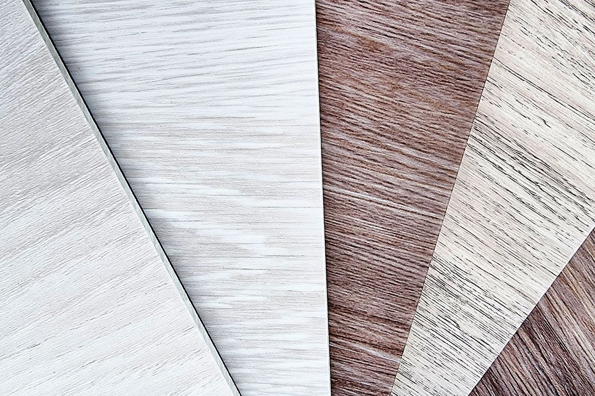 Samples of various wood grain textures, varying in shades of white and brown. Samples of various wood grain textures, varying in shades of white and brown.