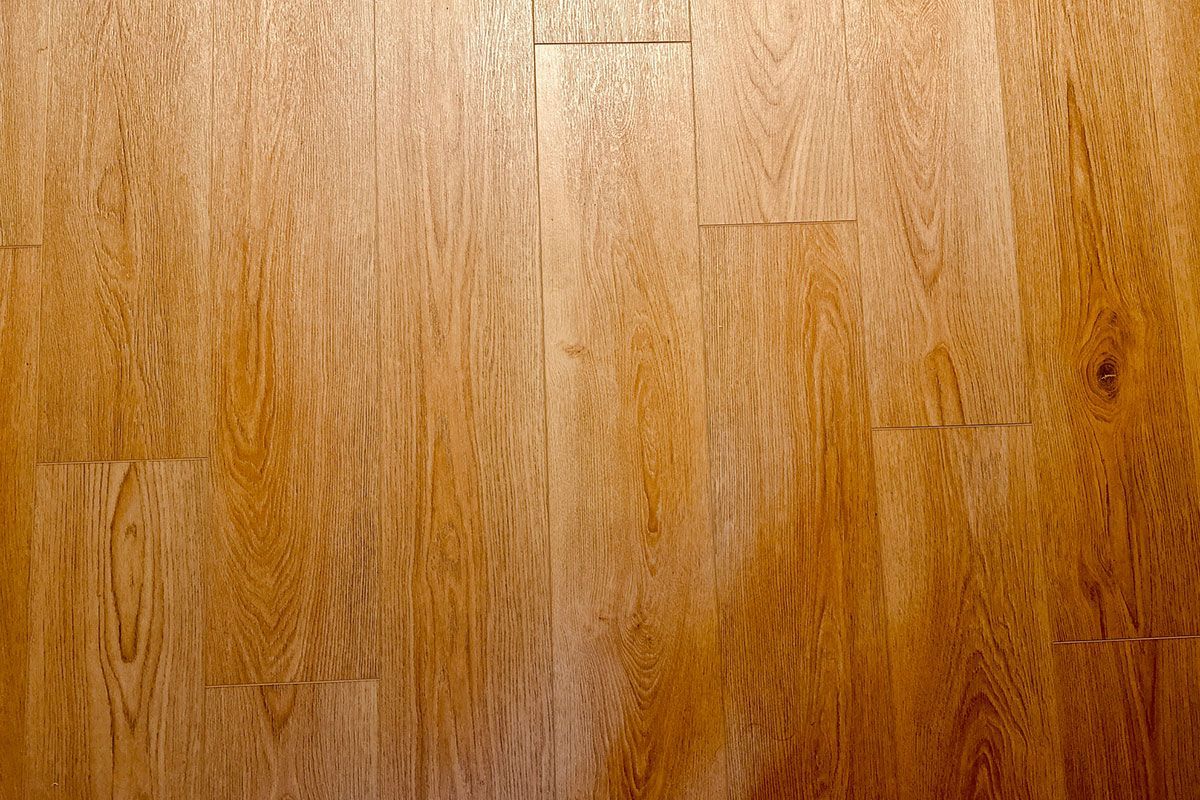 Wooden floorboards, light brown color, vertical wood grain pattern. Wooden floorboards, light brown color, vertical wood grain pattern.