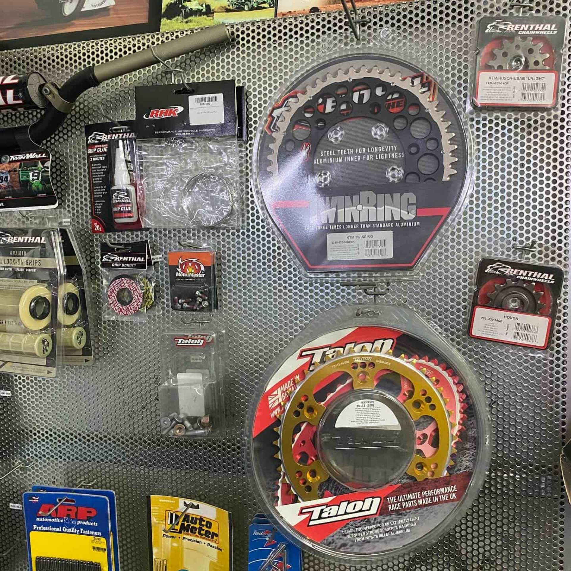Motorcycle Parts Display on a Metal Wall — Alice Springs Auto Parts in Ciccone, NT