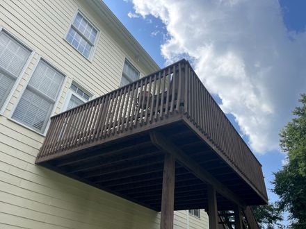 Existing raised wood deck before work began in Lawrenceville, Georgia