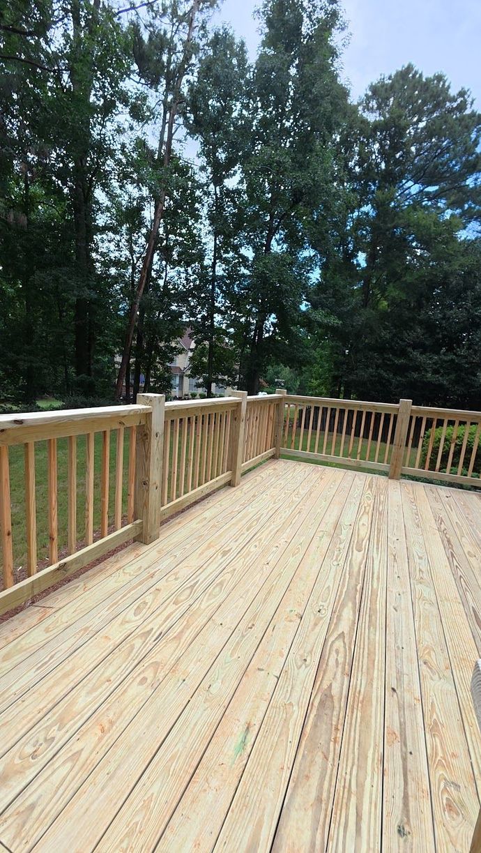 Rebuilt wood deck and railing in Jonesboro, Georgia