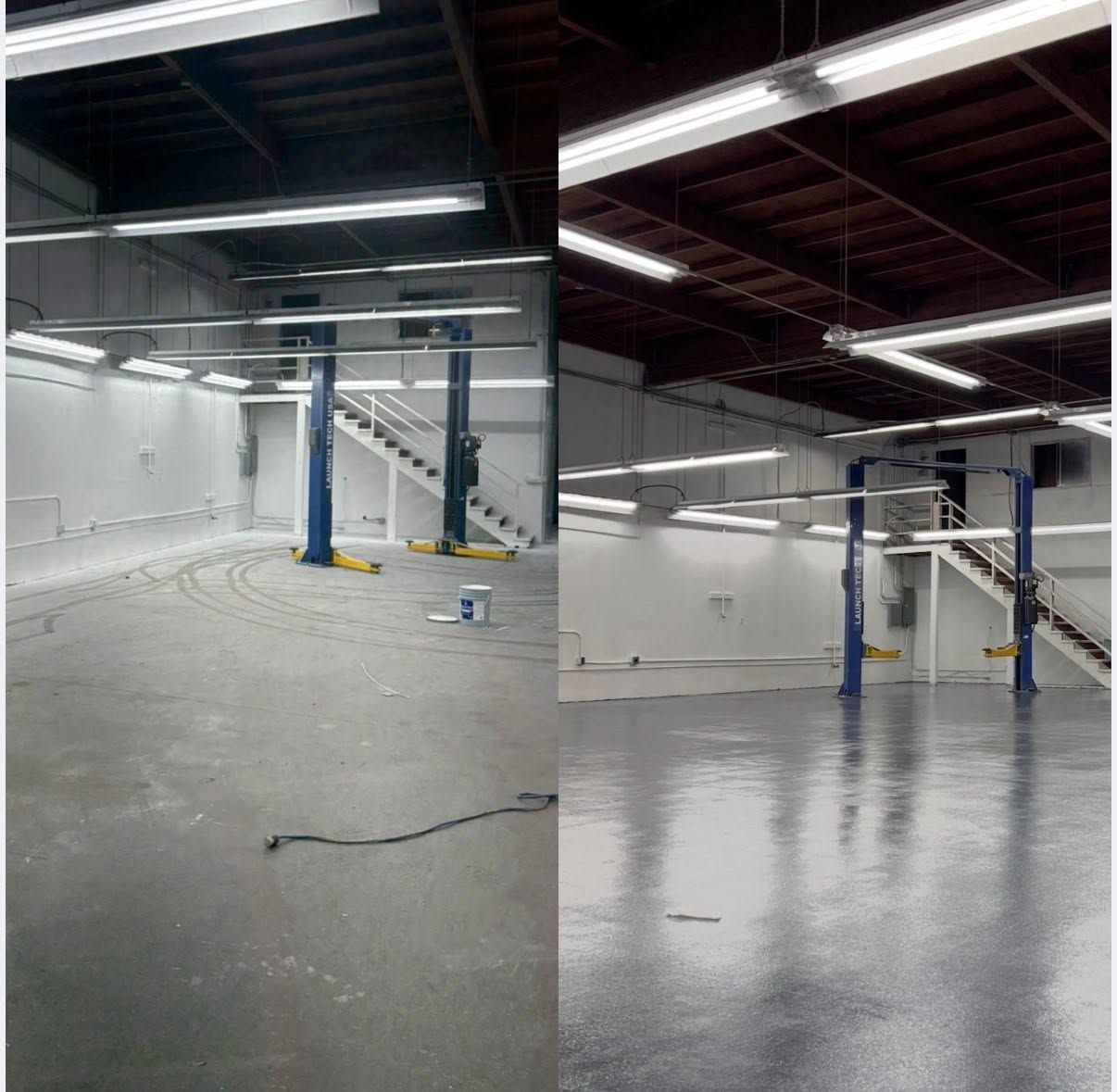 Empty industrial warehouse with wet gray floor, white walls, blue columns, and overhead lights
