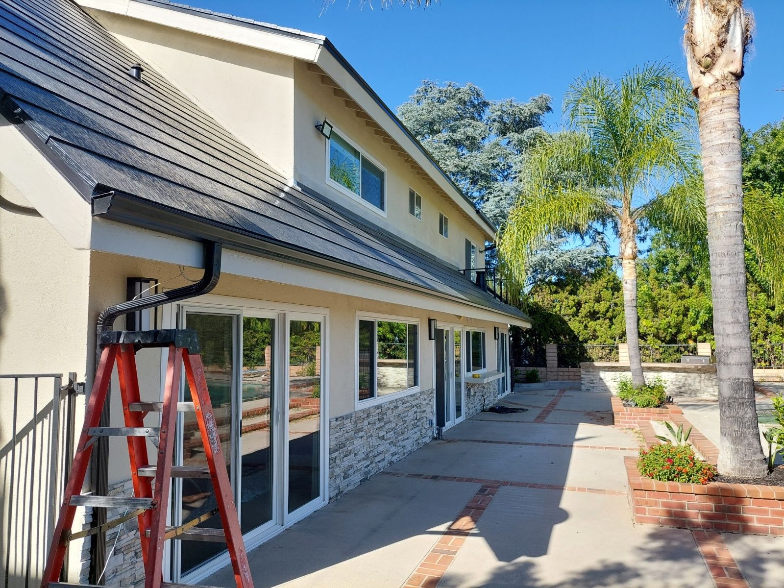 two story shingle roof gutters
