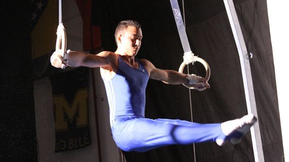 male gymnast on rings