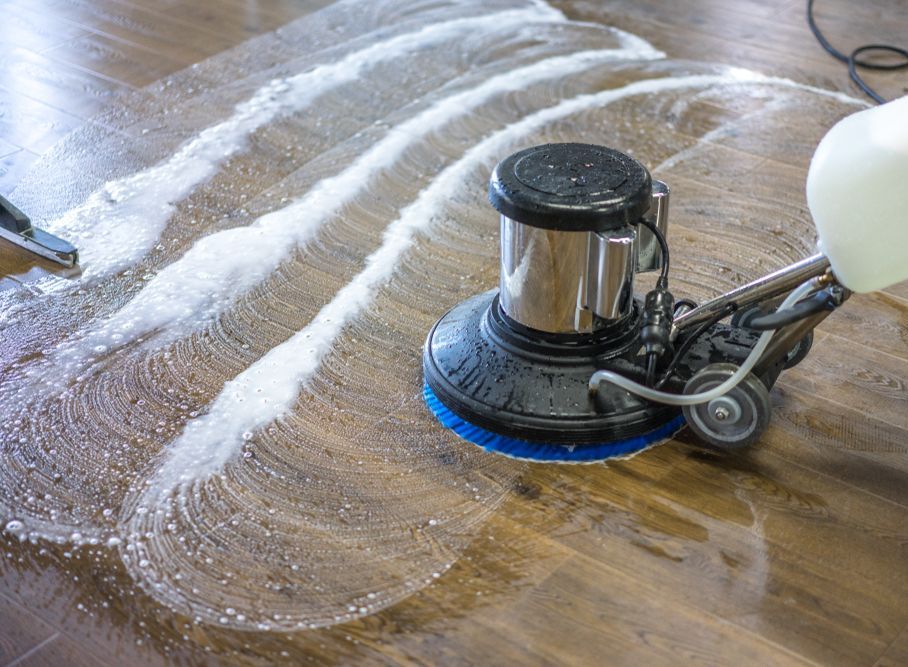 A Machine washing a wooden floor — Lease Clean Newcastle in Warners Bay, NSW