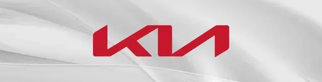 Red Kia logo centered on a silver-gray background.