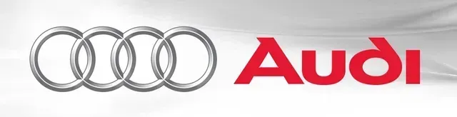Audi logo with four silver rings and red wordmark