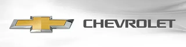 Chevrolet logo with gold bowtie emblem and gray wordmark on a white background