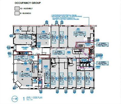 Floor plan marked with assembly and business occupancy groups.