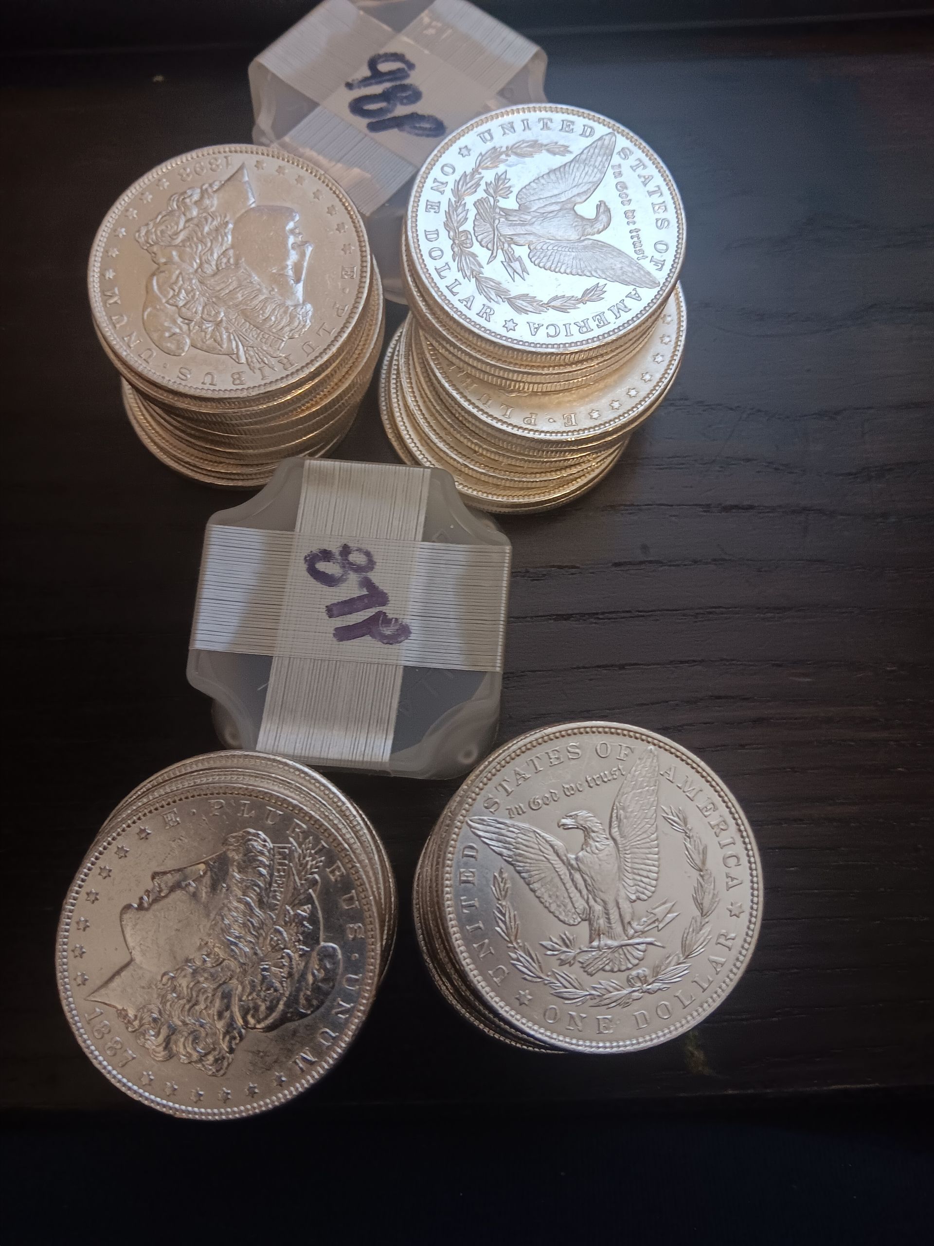 BRILLIANT UNCIRCULATED MIXXED & SOLID DATE ROLLS OF MORGANS AVAILABLE.