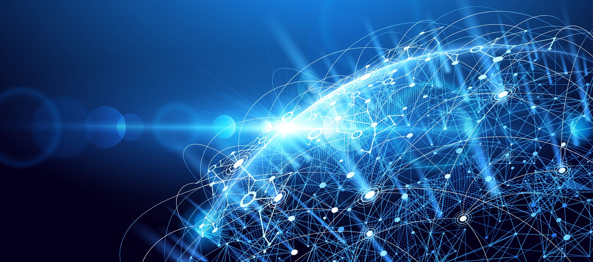 Abstract blue digital globe with interconnected lines and bright light.