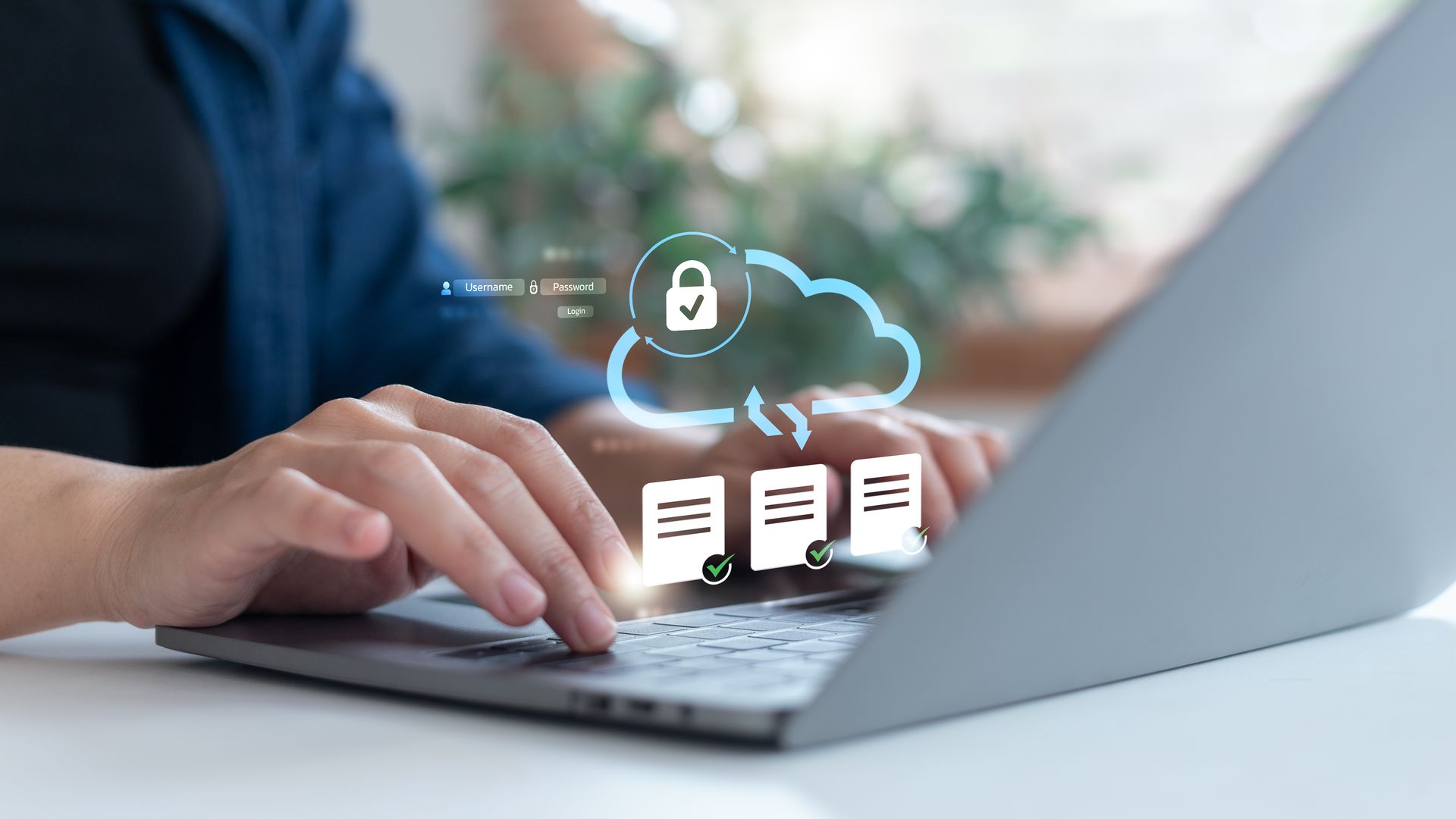 Person typing on laptop, cloud icon with lock symbolizing data security.