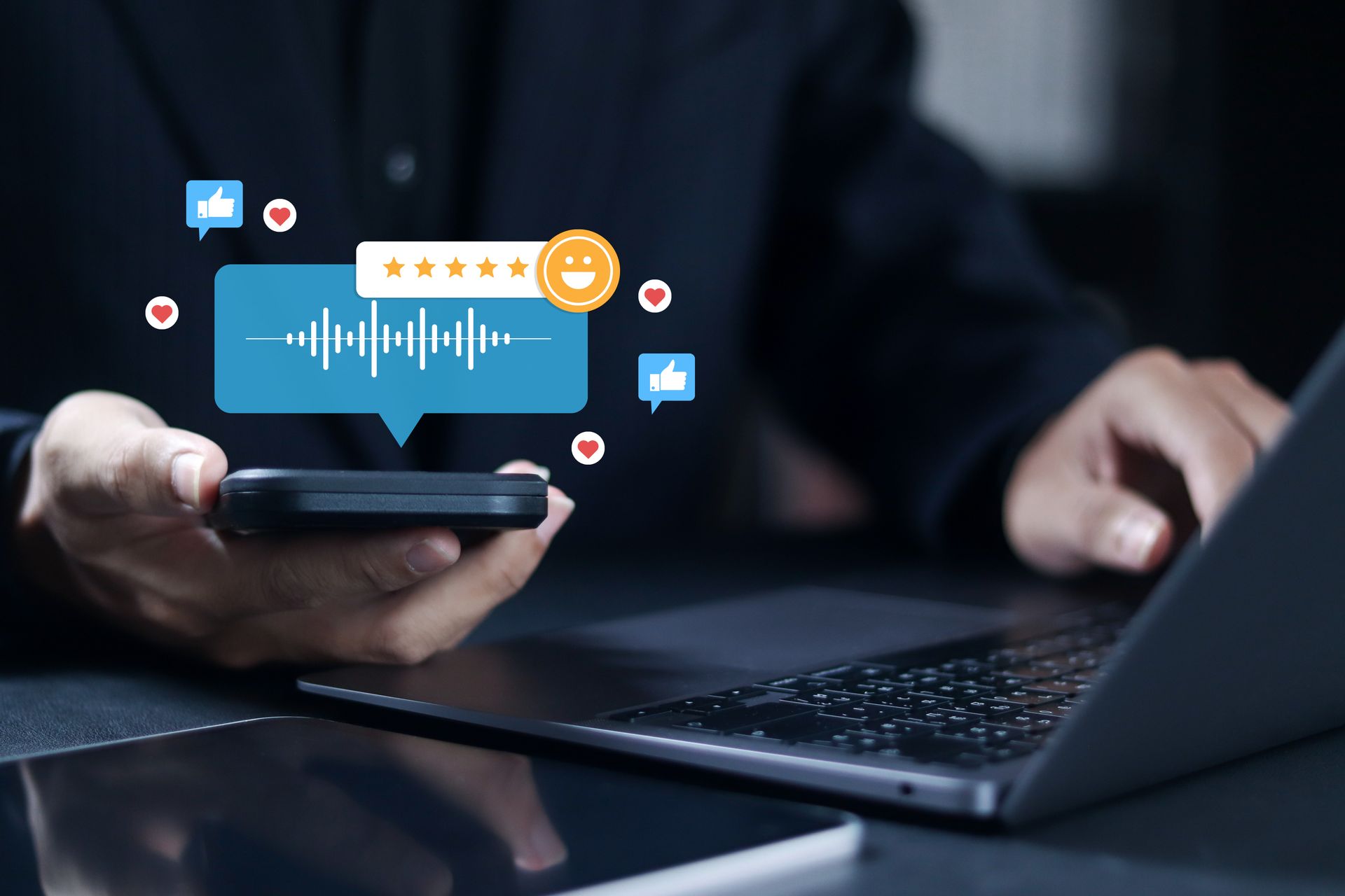 Person using a phone and laptop with floating speech bubble containing sound wave, five stars, and social media icons.