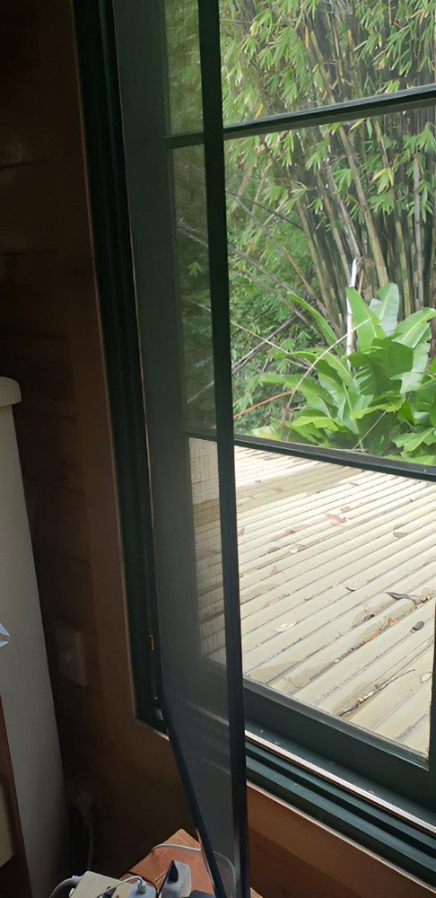 A Window With a Fly Screen on It — North Coast Screens & Repairs in Ballina, NSW