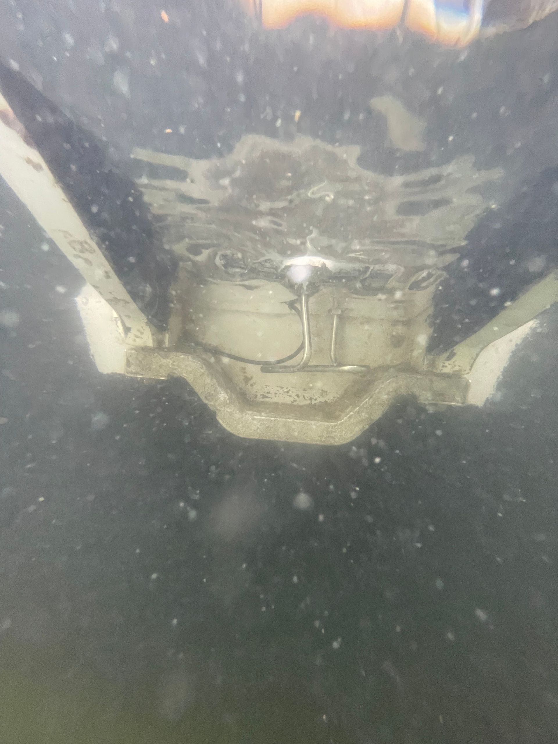 Bottom of Large White Boat Underwater — Palm Harbor, FL — Ozona Dive Service