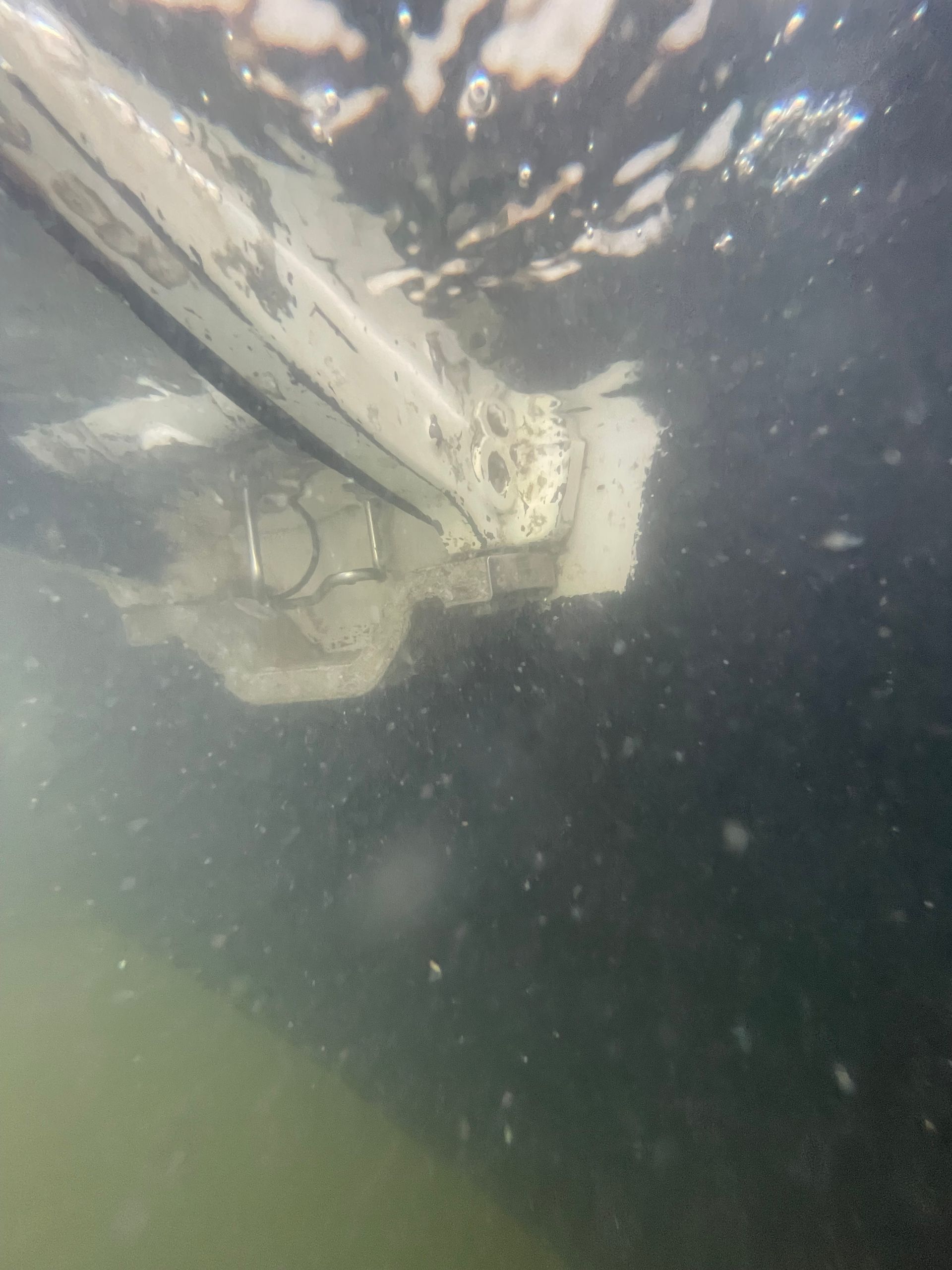 Bottom of White Boat Underwater — Palm Harbor, FL — Ozona Dive Service