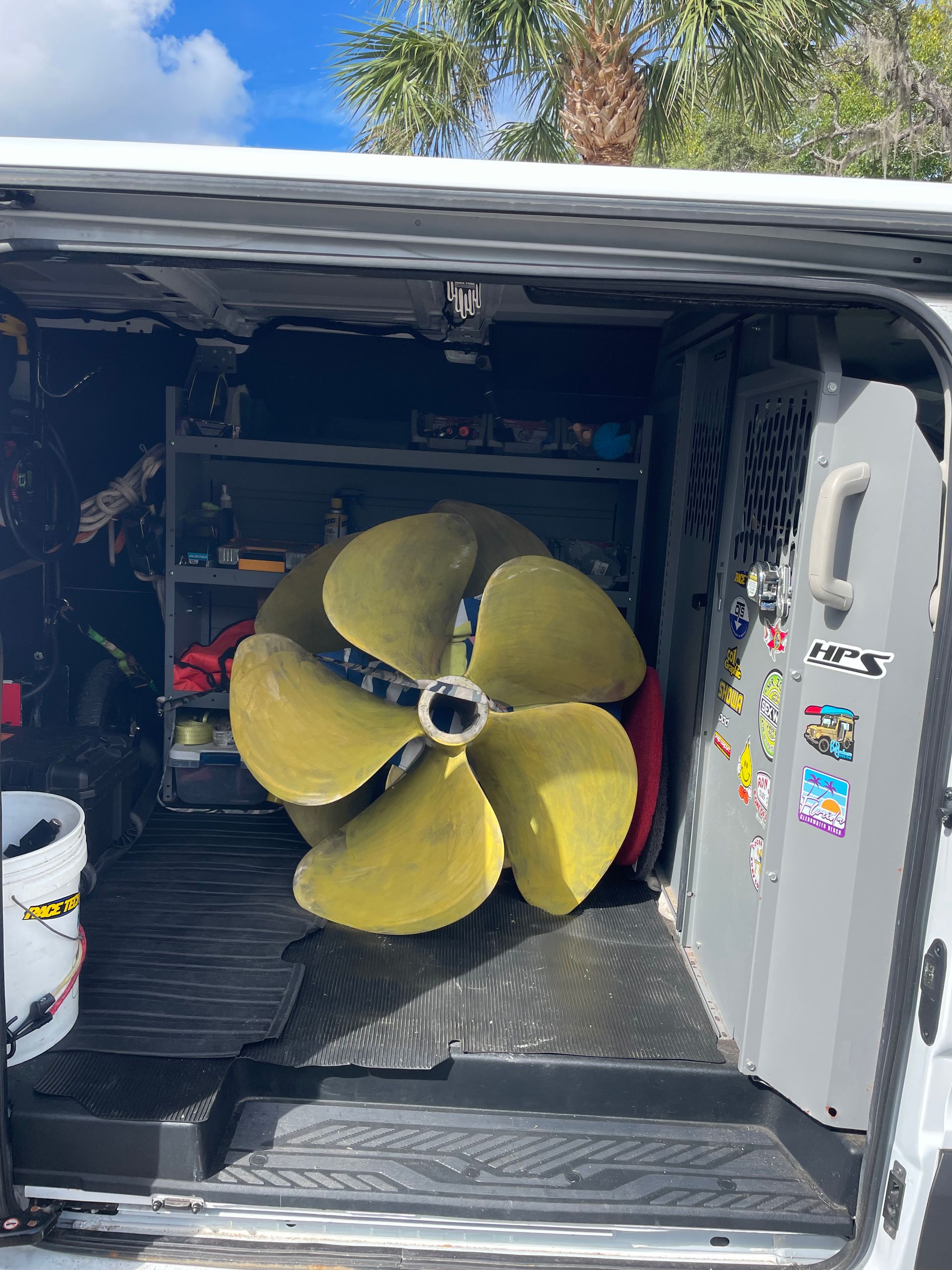 Two Yellow Boat Propeller Inside the Van — Palm Harbor, FL — Ozona Dive Service