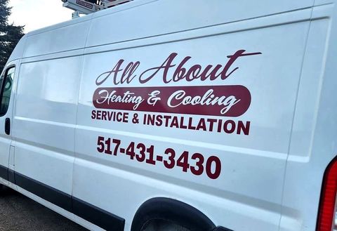 Van with the All About Heating & Cooling Logo on the side.