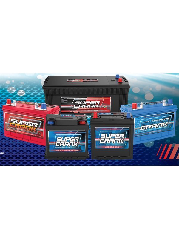 Man Carrying a Car Battery — Hydraulic Repair Service Coffs Harbour, NSW