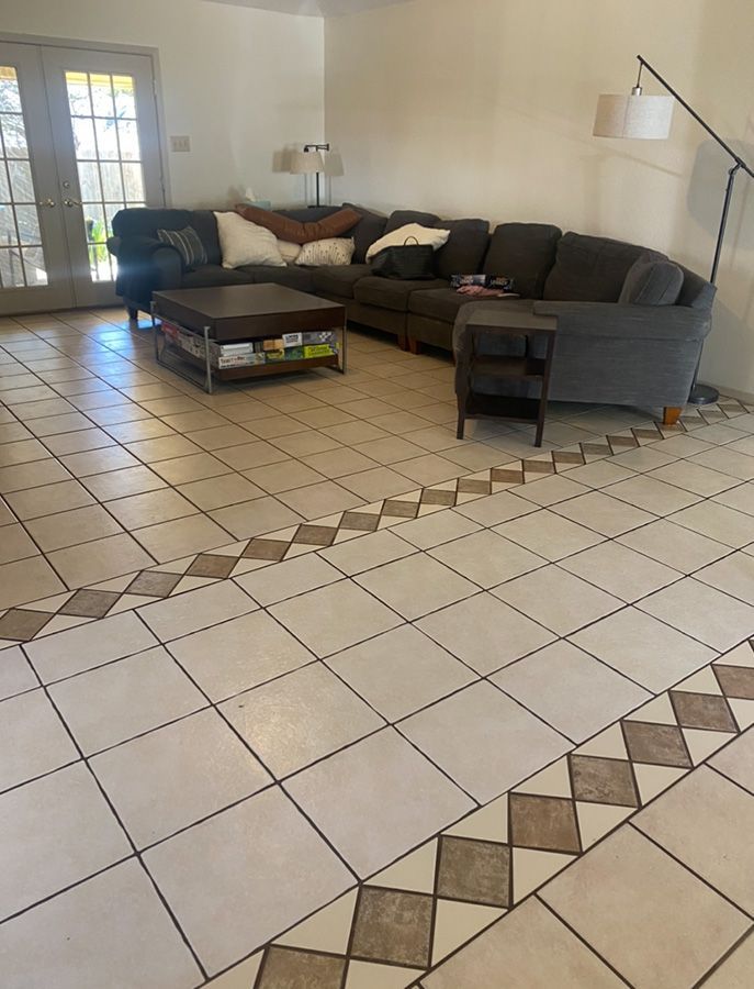 A living room with a couch and a coffee table