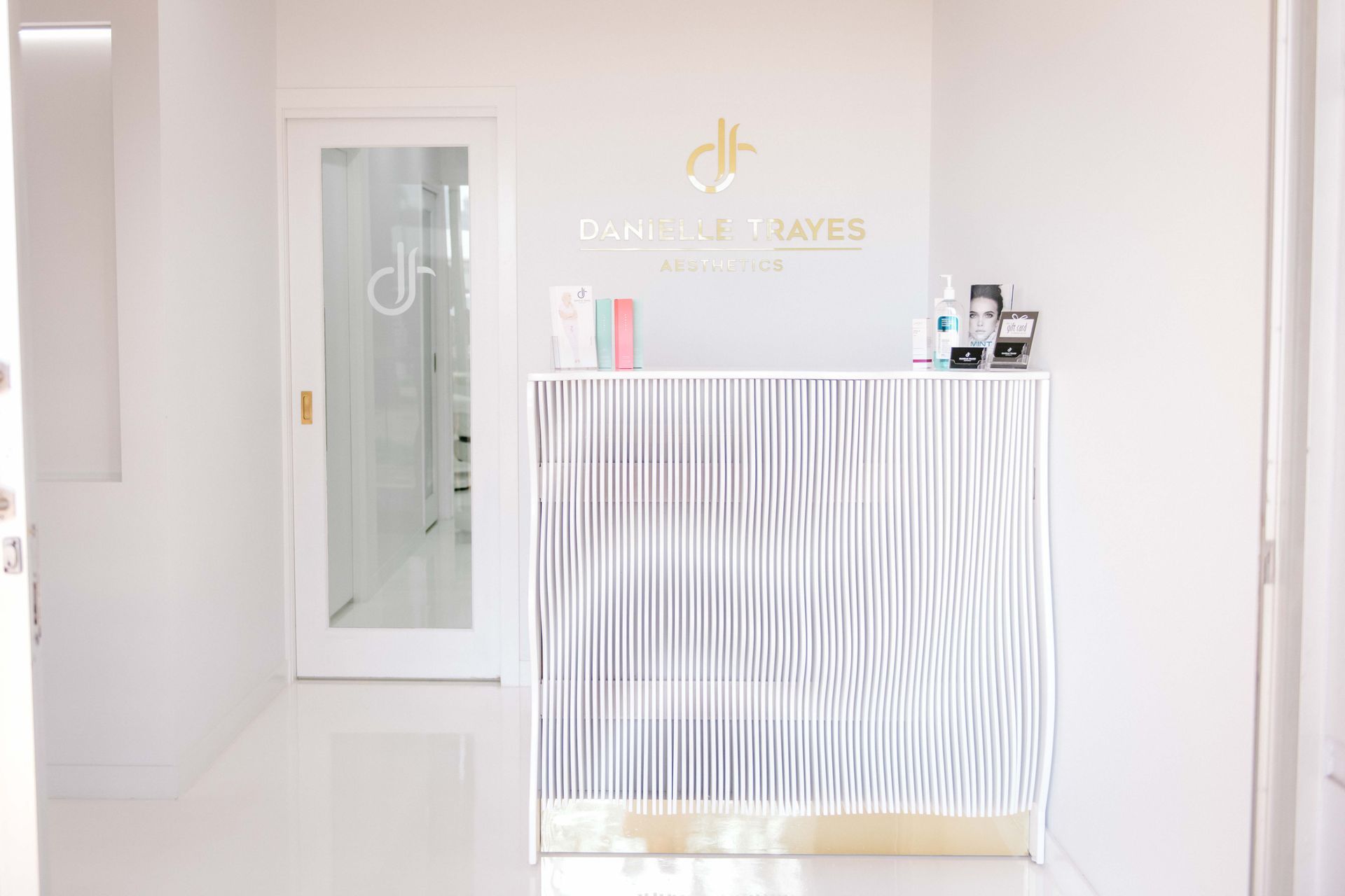 A white room with a zebra print counter and a door.