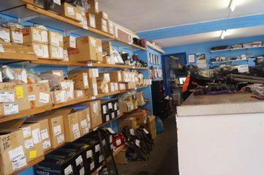 A store filled with lots of boxes and shelves.