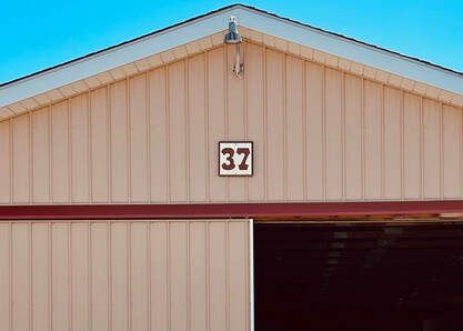 The number 32 is on the side of a building.