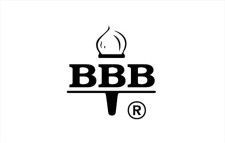a black and white logo for better business bureau with a torch and a crown .