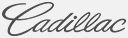 the word cadillac is written in cursive on a white background