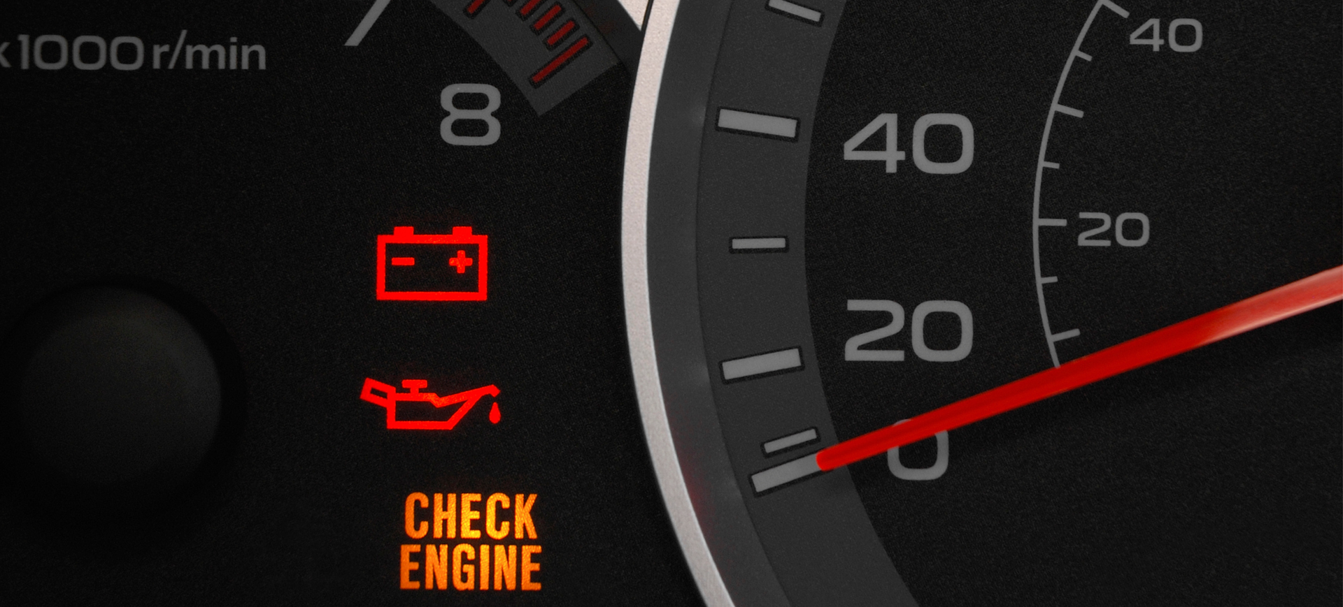 Vehicle dashboard showing check engine warning light on, signaling maintenance needed
