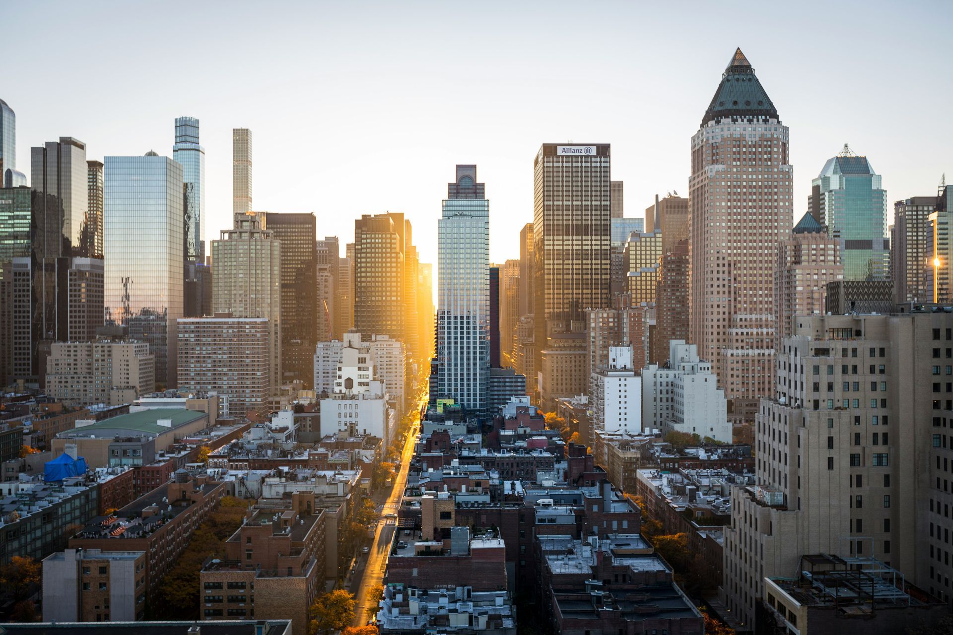 Dense Midtown Manhattan blocks from above, showing the tight streets and mixed building heights