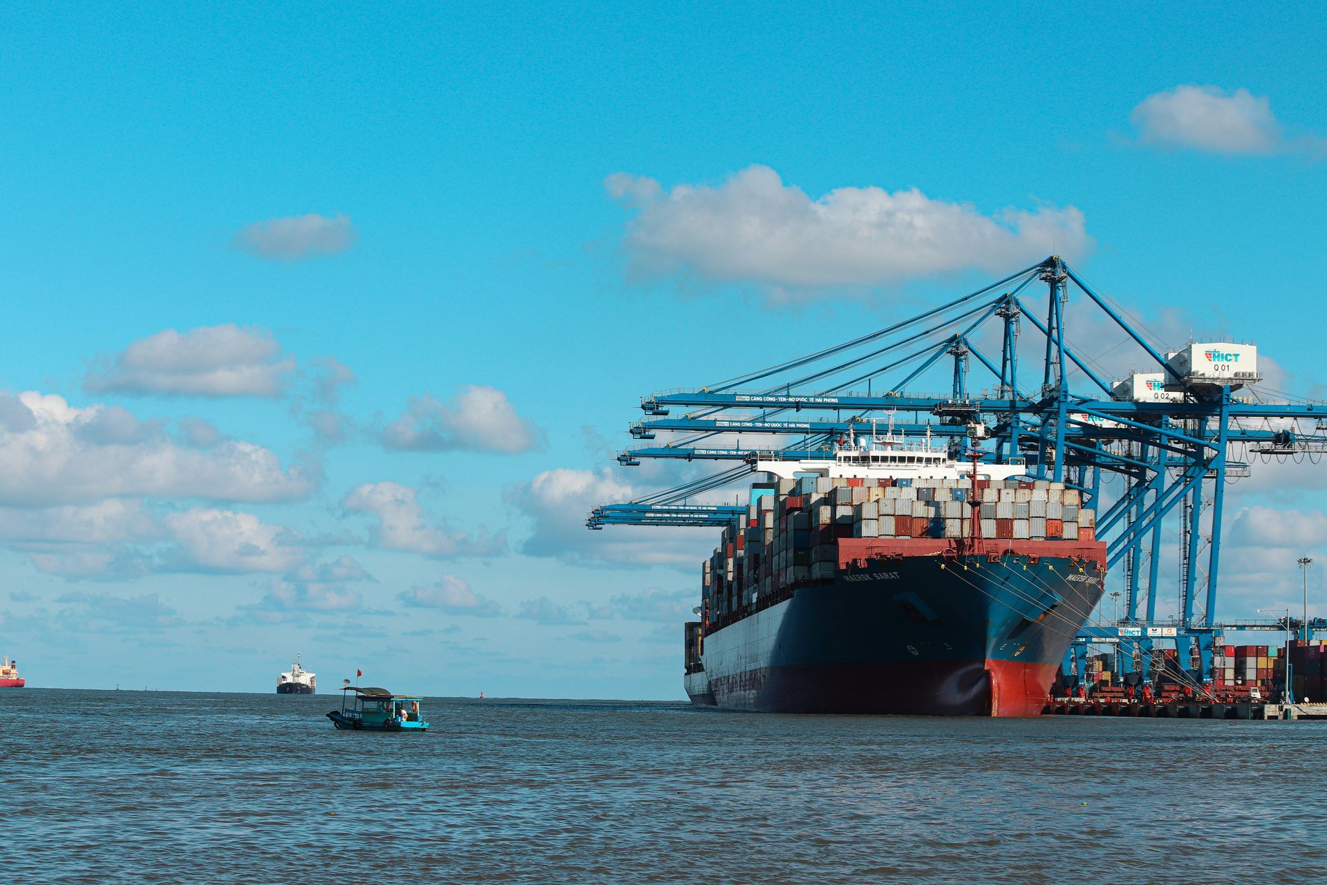 UK to India removals — container ship at Indian port representing The Indian Mover London to India moving company service