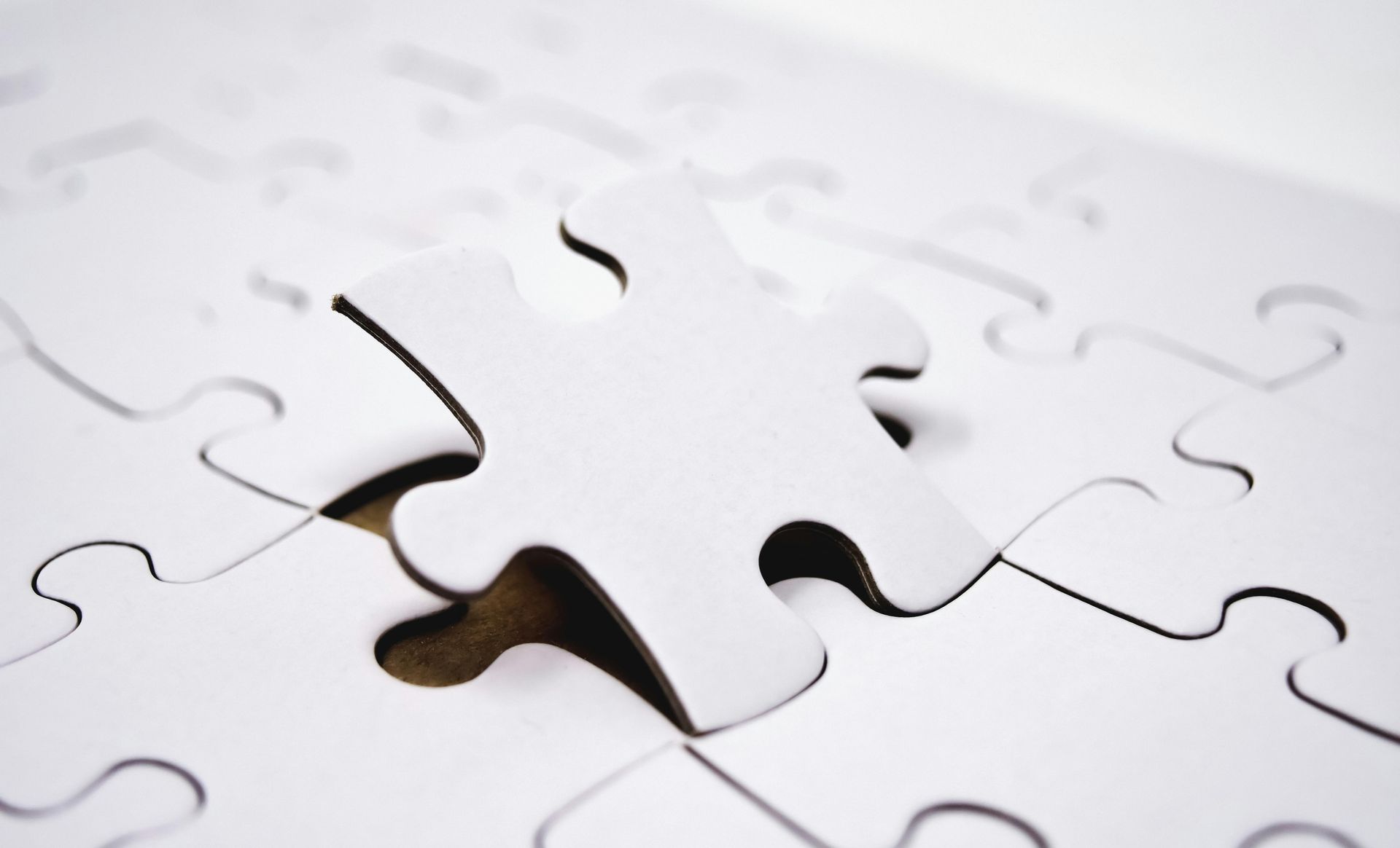 final puzzle piece placed symbolising closing leadership gap through executive recruitment strategy 2026