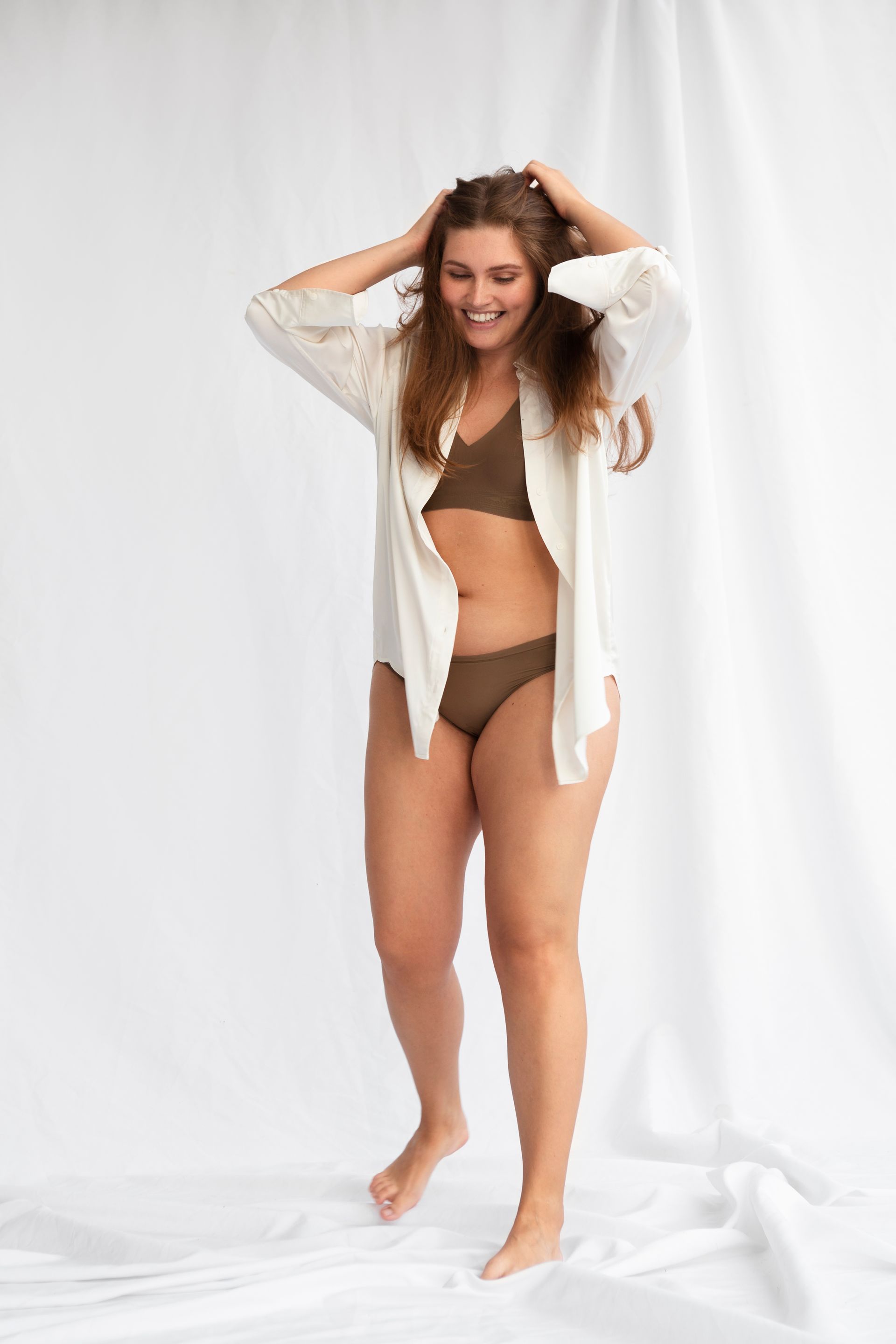 young beautiful plump woman loving her body