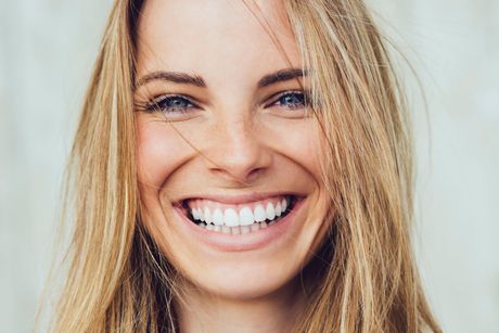 blonde lady smiling