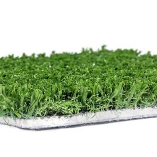 Green artificial grass turf mat with white backing on a white background